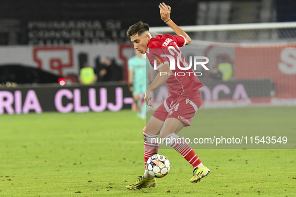 Adrian Caragea is in action during the Universitatea Cluj vs. Dinamo Bucuresti match at Cluj Arena in Cluj-Napoca, Romania, on September 2,...