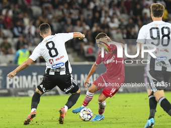 Catalin Cirjan is in action during Universitatea Cluj vs. Dinamo Bucuresti at Cluj Arena in Cluj-Napoca, Romania, on September 2, 2024. (