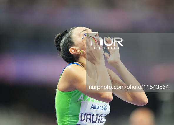 Lamiya Valiyeva of Azerbaijan celebrates winning gold in Women's 100m - T13 Final during the Paris 2024 Paralympic Games at Stade de France...