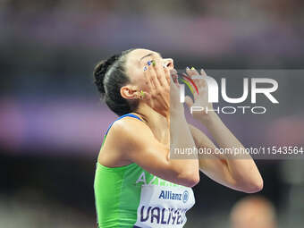 Lamiya Valiyeva of Azerbaijan celebrates winning gold in Women's 100m - T13 Final during the Paris 2024 Paralympic Games at Stade de France...