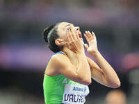 Lamiya Valiyeva of Azerbaijan celebrates winning gold in Women's 100m - T13 Final during the Paris 2024 Paralympic Games at Stade de France...