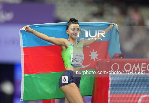 Lamiya Valiyeva of Azerbaijan celebrates winning gold in Women's 100m - T13 Final during the Paris 2024 Paralympic Games at Stade de France...