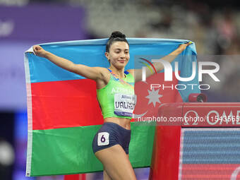 Lamiya Valiyeva of Azerbaijan celebrates winning gold in Women's 100m - T13 Final during the Paris 2024 Paralympic Games at Stade de France...