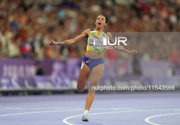 Rayane Soares Da Silva of Brazil celebrates winning silver in Women's 100m - T13 Final during the Paris 2024 Paralympic Games at Stade de Fr...