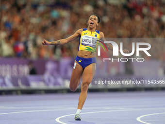 Rayane Soares Da Silva of Brazil celebrates winning silver in Women's 100m - T13 Final during the Paris 2024 Paralympic Games at Stade de Fr...