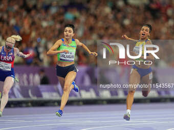 Lamiya Valiyeva of Azerbaijan celebrates winning gold in Women's 100m - T13 Final during the Paris 2024 Paralympic Games at Stade de France...