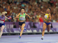 Lamiya Valiyeva of Azerbaijan celebrates winning gold in Women's 100m - T13 Final during the Paris 2024 Paralympic Games at Stade de France...