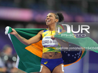 Rayane Soares Da Silva of Brazil celebrates winning silver in Women's 100m - T13 Final during the Paris 2024 Paralympic Games at Stade de Fr...