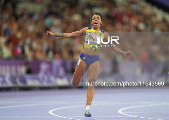 Rayane Soares Da Silva of Brazil celebrates winning silver in Women's 100m - T13 Final during the Paris 2024 Paralympic Games at Stade de Fr...