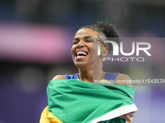 Rayane Soares Da Silva of Brazil celebrates winning silver in Women's 100m - T13 Final during the Paris 2024 Paralympic Games at Stade de Fr...