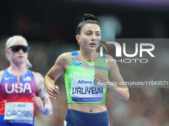 Lamiya Valiyeva of Azerbaijan celebrates winning gold in Women's 100m - T13 Final during the Paris 2024 Paralympic Games at Stade de France...