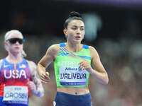 Lamiya Valiyeva of Azerbaijan celebrates winning gold in Women's 100m - T13 Final during the Paris 2024 Paralympic Games at Stade de France...