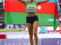 Lamiya Valiyeva of Azerbaijan celebrates winning gold in Women's 100m - T13 Final during the Paris 2024 Paralympic Games at Stade de France...