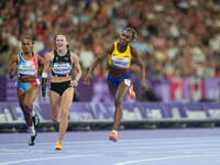 Kiara Rodriguez of Ecuador celebrates winning gold in Women's 100m - T46 Final during the Paris 2024 Paralympic Games at Stade de France on...