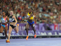 Kiara Rodriguez of Ecuador celebrates winning gold in Women's 100m - T46 Final during the Paris 2024 Paralympic Games at Stade de France on...