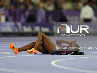 Kym Crosby of United States of America on the ground in Women's 100m - T13 Final during the Paris 2024 Paralympic Games at Stade de France o...