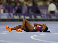 Kym Crosby of United States of America on the ground in Women's 100m - T13 Final during the Paris 2024 Paralympic Games at Stade de France o...