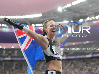 Anna Grimaldi of New Zealand celebrates winning bronze in Women's 100m - T47 Final during the Paris 2024 Paralympic Games at Stade de France...