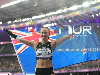 Anna Grimaldi of New Zealand celebrates winning bronze in Women's 100m - T47 Final during the Paris 2024 Paralympic Games at Stade de France...