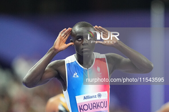 Charles-Antoine Kouakou of France gestures in Men's 400m - T20 Final during the Paris 2024 Paralympic Games at Stade de France on September...