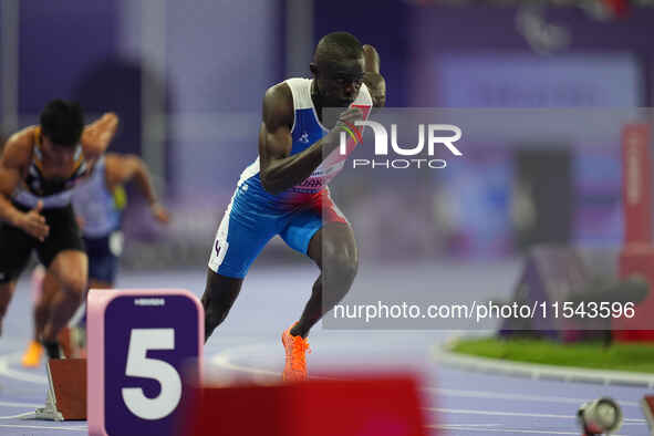 Charles-Antoine Kouakou of France in action in Men's 400m - T20 Final during the Paris 2024 Paralympic Games at Stade de France on September...