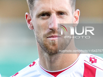 Georgios Kyriakopoulos of AC Monza looks on during the Serie A Enilive match between ACF Fiorentina and AC Monza at Stadio Artemio Franchi o...