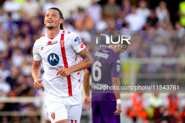 Milan Djuric of AC Monza celebrates after scoring first goal during the Serie A Enilive match between ACF Fiorentina and AC Monza at Stadio...