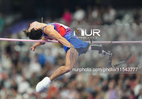 Ezra Frech of United States of America celebrates winning gold in Men's High Jump - T63 Final during the Paris 2024 Paralympic Games at Stad...