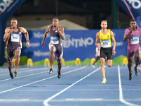 Lorenzo Patta from Italy, Michael Campbell from Jamaica, and Ole Edoburun from Great Britain participate in the 60th Palio Citta della Querc...