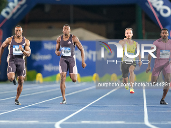 (Left to right) Ronnie Baker from the United States, Ole Edoburun from Great Britain, Lorenzo Patta from Italy, and Michael Campbell from Ja...