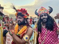 Hindu devotees dress in colorful costumes at the historic Sree Padmanabhaswamy Temple during the Panguni Utsavam (Painkuni Utsavam) festival...