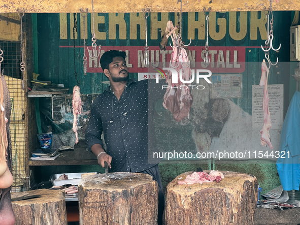 A butcher cuts meat at the Connemara market (Palayam Market) in Thiruvananthapuram, Kerala, India, on April 13, 2024. The Connemara market (...