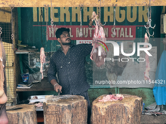 A butcher cuts meat at the Connemara market (Palayam Market) in Thiruvananthapuram, Kerala, India, on April 13, 2024. The Connemara market (...