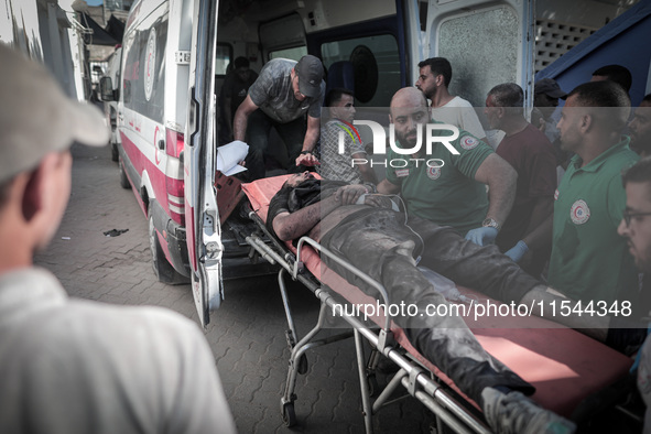 A number of martyrs and wounded, most of them children, arrive at the Arab High Hospital from different areas of Gaza City on September 3, 2...