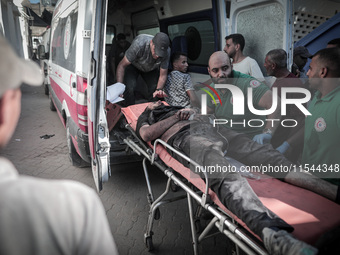 A number of martyrs and wounded, most of them children, arrive at the Arab High Hospital from different areas of Gaza City on September 3, 2...