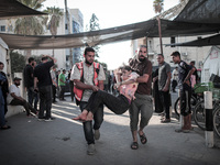 A number of martyrs and wounded, most of them children, arrive at the Arab High Hospital from different areas of Gaza City on September 3, 2...