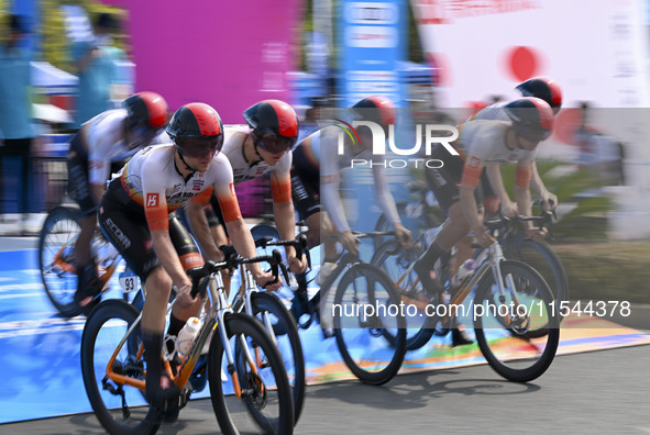 Participants ride during the 12th Round of the Poyang Lake International Cycling Competition in Leping, China, on September 3, 2024. 