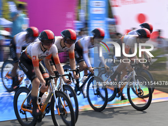 Participants ride during the 12th Round of the Poyang Lake International Cycling Competition in Leping, China, on September 3, 2024. (