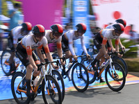 Participants ride during the 12th Round of the Poyang Lake International Cycling Competition in Leping, China, on September 3, 2024. (