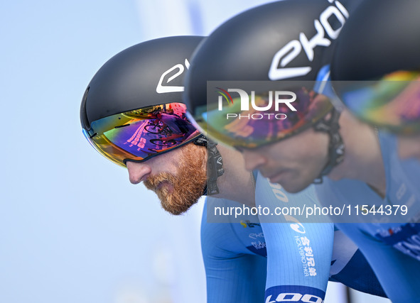 Participants get ready at the starting point of the 12th Poyang Lake International Cycling Competition in Leping, China, on September 3, 202...