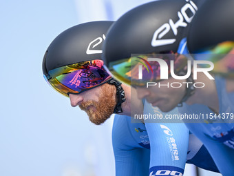 Participants get ready at the starting point of the 12th Poyang Lake International Cycling Competition in Leping, China, on September 3, 202...