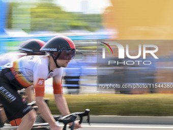 Participants ride during the 12th Round of the Poyang Lake International Cycling Competition in Leping, China, on September 3, 2024. (