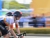 Participants ride during the 12th Round of the Poyang Lake International Cycling Competition in Leping, China, on September 3, 2024. (