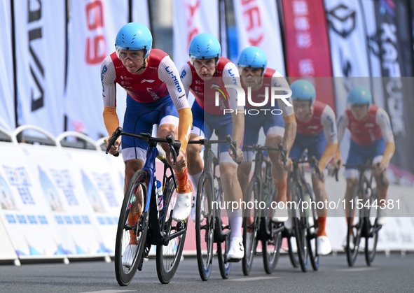 Participants ride during the 12th Round of the Poyang Lake International Cycling Competition in Leping, China, on September 3, 2024. 