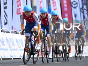 Participants ride during the 12th Round of the Poyang Lake International Cycling Competition in Leping, China, on September 3, 2024. (