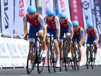 Participants ride during the 12th Round of the Poyang Lake International Cycling Competition in Leping, China, on September 3, 2024. (