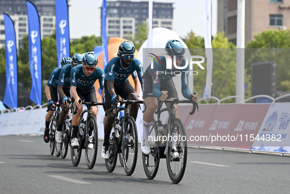 Participants ride during the 12th Round of the Poyang Lake International Cycling Competition in Leping, China, on September 3, 2024. 