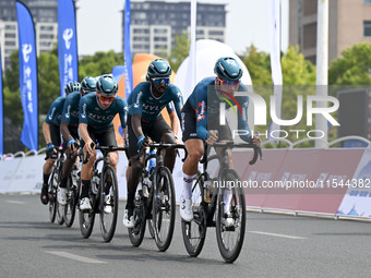 Participants ride during the 12th Round of the Poyang Lake International Cycling Competition in Leping, China, on September 3, 2024. (