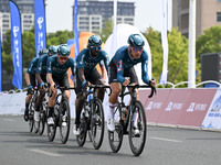 Participants ride during the 12th Round of the Poyang Lake International Cycling Competition in Leping, China, on September 3, 2024. (