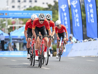 Participants ride during the 12th Round of the Poyang Lake International Cycling Competition in Leping, China, on September 3, 2024. (